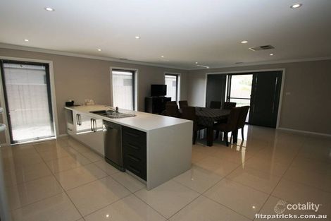 Property photo of 4 Bindari Avenue Glenfield Park NSW 2650