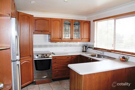 Property photo of 15 Kenley Crescent Macquarie Hills NSW 2285