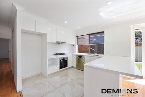 Property photo of 21 Burdekin Court Wattle Grove NSW 2173