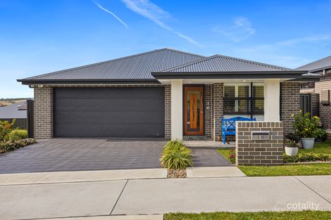18 Coral Tree Cres, Calderwood, NSW 2527