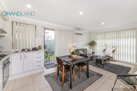 Property photo of 27 Sawsedge Avenue Denham Court NSW 2565