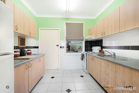 Property photo of 14 Canberra Road Lake Heights NSW 2502