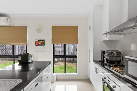 Property photo of 22 Kingsborough Pass Trinity Park QLD 4879