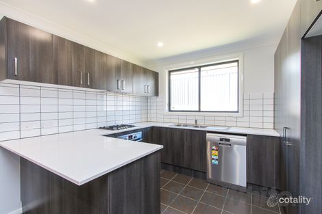 Property photo of 12 Kariba Close Macquarie Hills NSW 2285