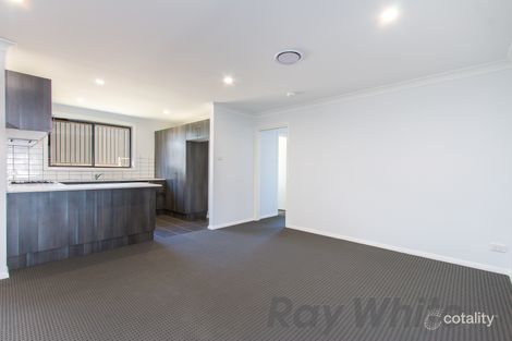 Property photo of 12 Kariba Close Macquarie Hills NSW 2285