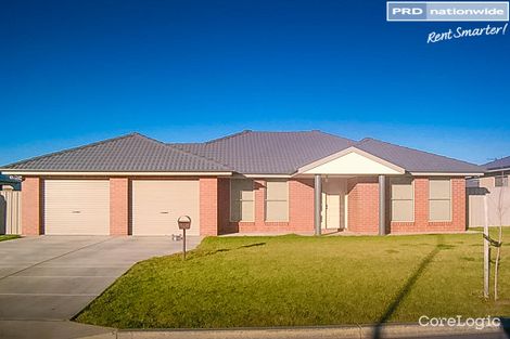 Property photo of 18 Womboin Crescent Glenfield Park NSW 2650