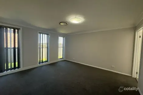 Property photo of 21 Hooghly Avenue Cameron Park NSW 2285