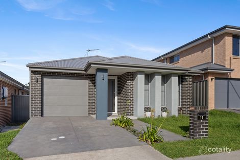 11 Wildflower Cres, Calderwood, NSW 2527