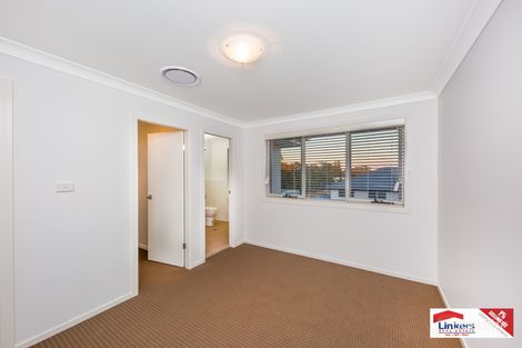 Property photo of 1 Highland Close Macquarie Links NSW 2565