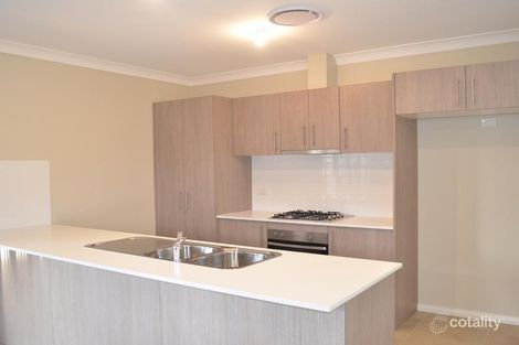 Property photo of 21 Regalia Crescent Glenfield NSW 2167