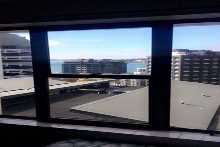 Photo of property in Orange Apartments/victoria Centr, 703/169 The Terrace, Wellington Central, Wellington, 6011