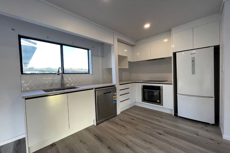 Photo of property in 2/69 Simon Ellice Drive, Bayview, Auckland, 0629