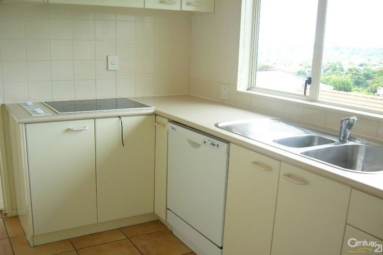 Photo of property in 2/61 Wiltshire Place, Somerville, Auckland, 2014