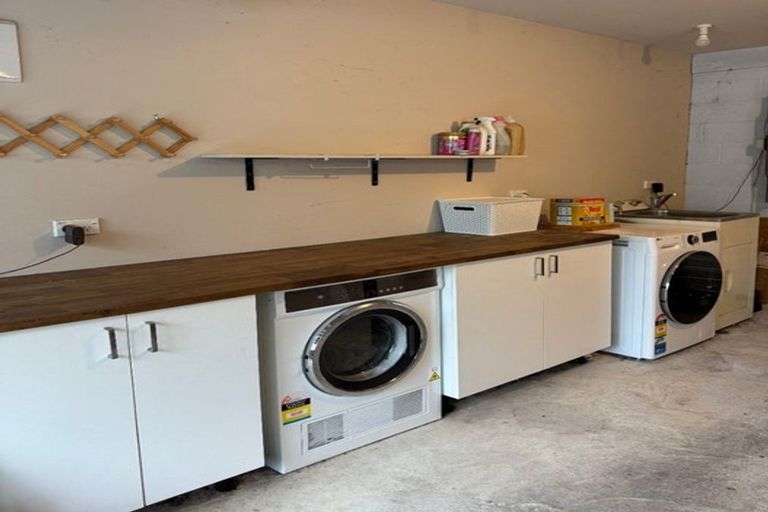 Photo of property in 2/57 Aeroview Drive, Beach Haven, Auckland, 0626