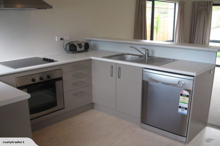 Photo of property in 21 Lantana Road, Green Bay, Auckland, 0604