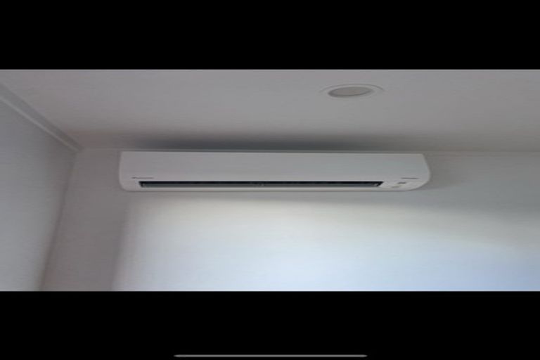 Photo of property in 2/1020 East Coast Road, Fairview Heights, Auckland, 0630