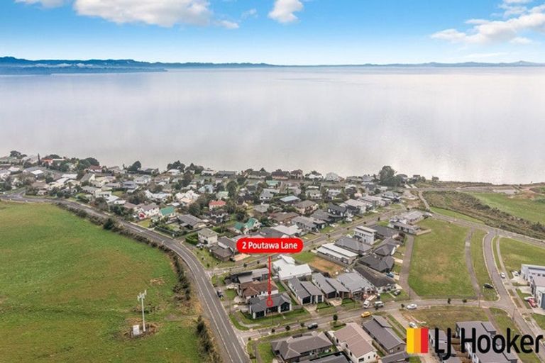 Photo of property in 2 Poutawa Lane, Clarks Beach, 2122