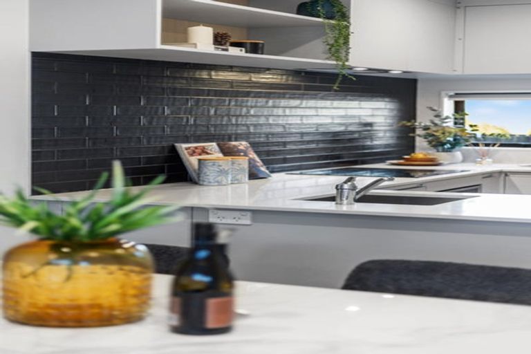 Photo of property in 2/119 Bruce Mclaren Road, Henderson, Auckland, 0612