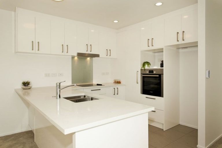 Photo of property in Apollo Apartments, 201/46 Rosedale Road, Rosedale, Auckland, 0632