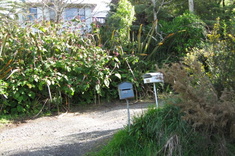 Photo of property in 48 Rauhuia Crescent, Parau, Auckland, 0604