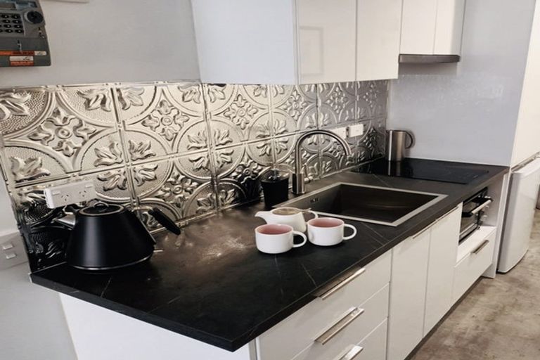 Photo of property in Orange Apartments/victoria Centr, 101/169 The Terrace, Wellington Central, Wellington, 6011