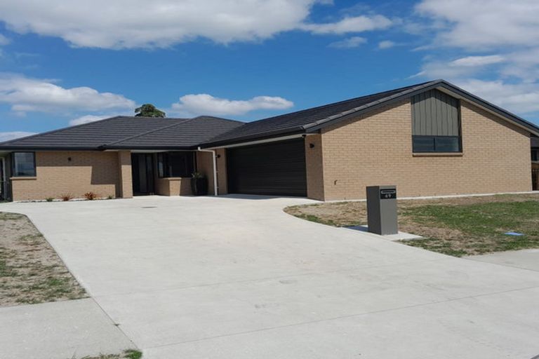 Photo of property in 69 Kaurinui Crescent, One Tree Point, 0118