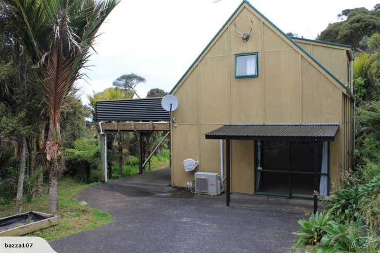 Photo of property in 1 Rauhuia Crescent, Parau, Auckland, 0604