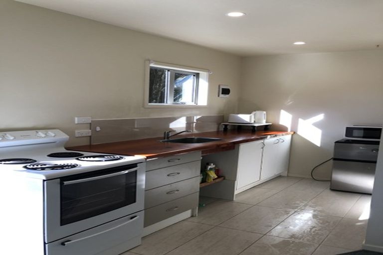 Photo of property in 903 West Coast Road, Waiatarua, Auckland, 0604