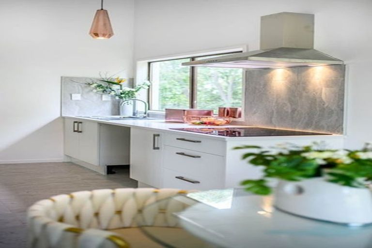 Photo of property in 1/13 Hollyhock Place, Browns Bay, Auckland, 0630