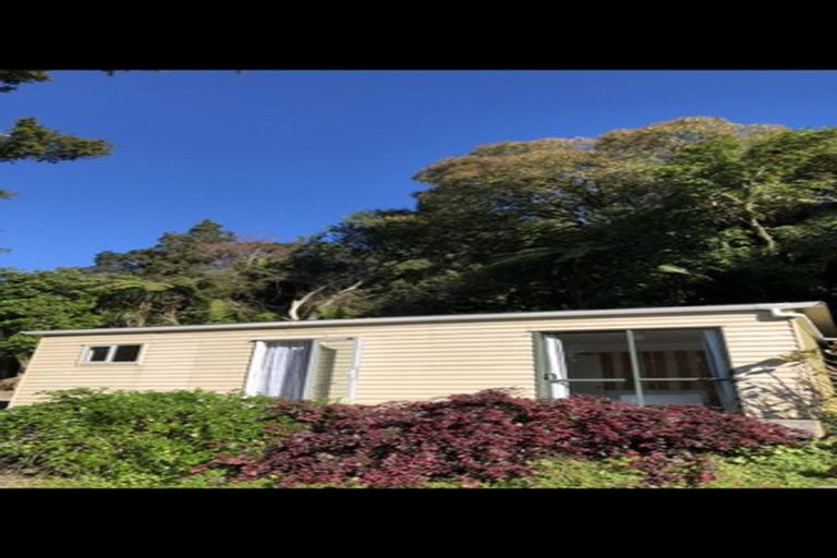 Photo of property in 903 West Coast Road, Waiatarua, Auckland, 0604