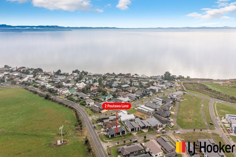 Photo of property in 2 Poutawa Lane, Clarks Beach, 2122