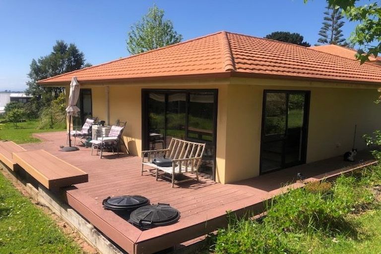 Photo of property in 1121a Whangaparaoa Road, Tindalls Beach, Whangaparaoa, 0930