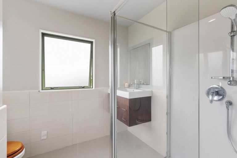 Photo of property in 77 Caribbean Drive, Unsworth Heights, Auckland, 0632