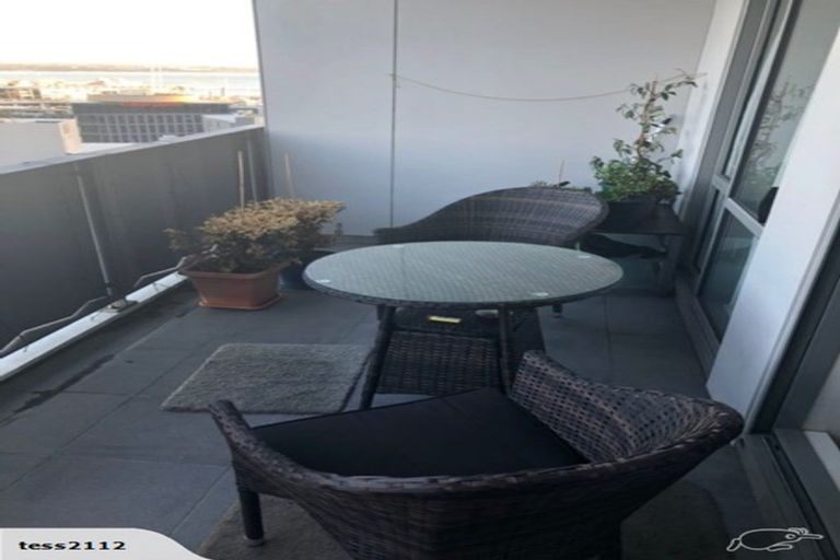 Photo of property in Alpha Apartments, 602/17 Vogel Lane, Auckland Central, Auckland, 1010