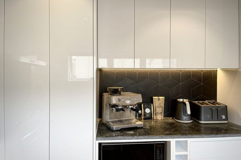 Photo of property in 1/894 East Coast Road, Northcross, Auckland, 0630