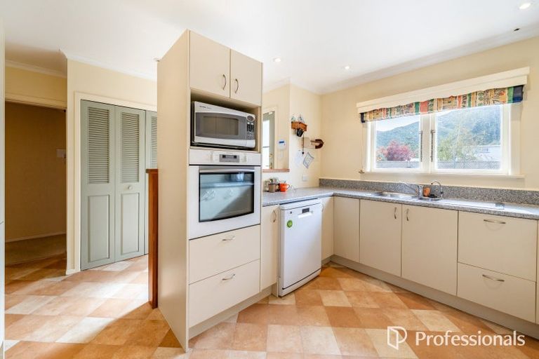 Photo of property in 4 Miles Crescent, Wainuiomata, Lower Hutt, 5014