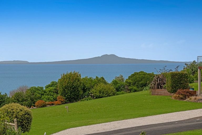 Photo of property in 1031 Whangaparaoa Road, Tindalls Beach, Whangaparaoa, 0930