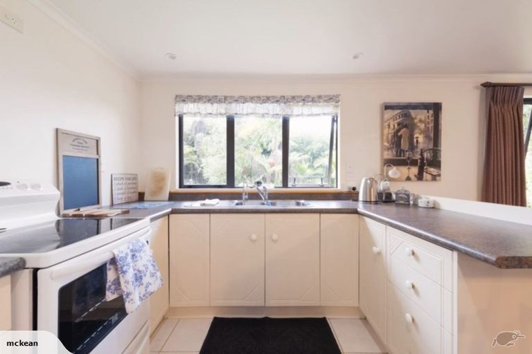 Photo of property in 117 East Coast Road, Castor Bay, Auckland, 0620