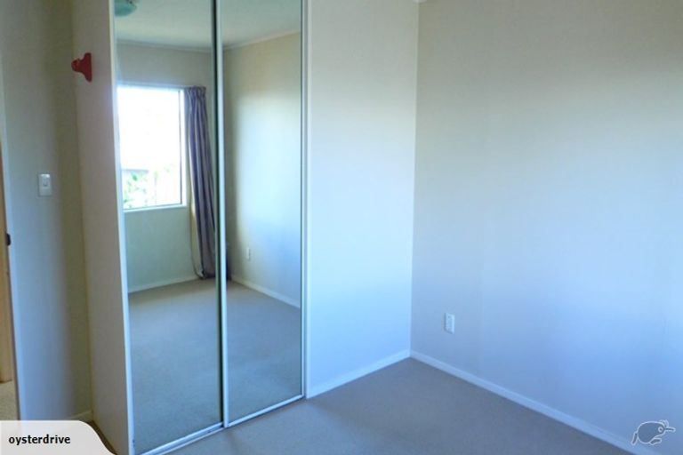 Photo of property in 1/6 Grenadine Place, Unsworth Heights, Auckland, 0632