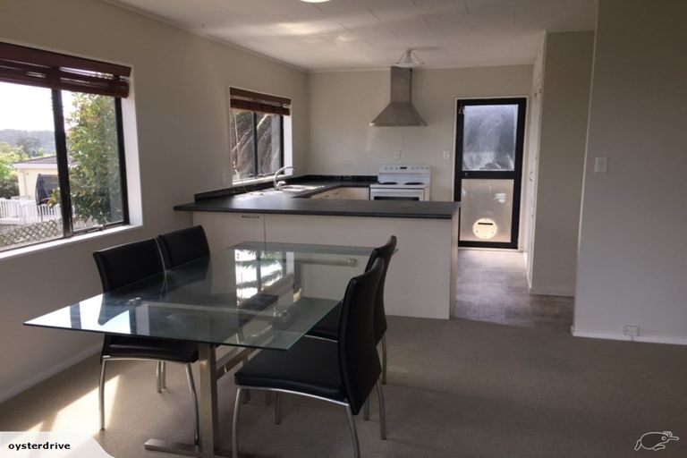 Photo of property in 1/6 Grenadine Place, Unsworth Heights, Auckland, 0632