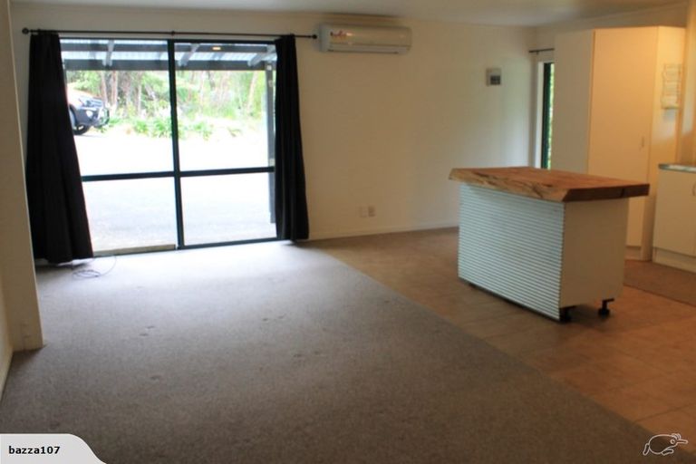 Photo of property in 1 Rauhuia Crescent, Parau, Auckland, 0604