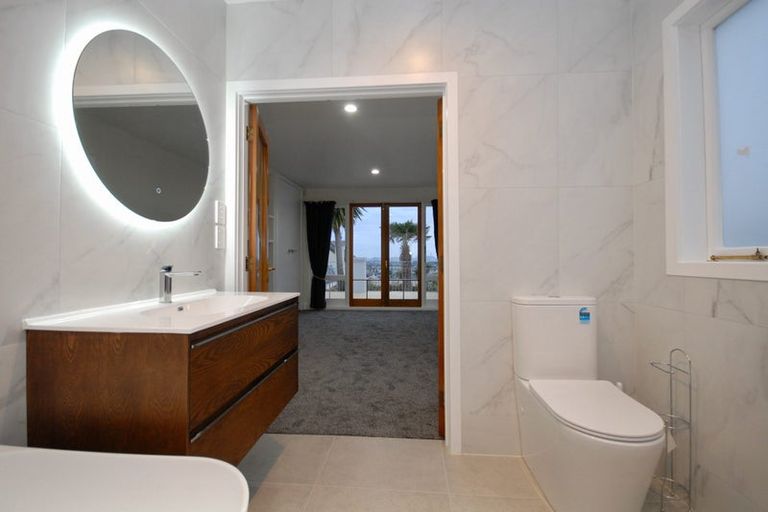 Photo of property in 2/13 Castor Bay Road, Castor Bay, Auckland, 0620