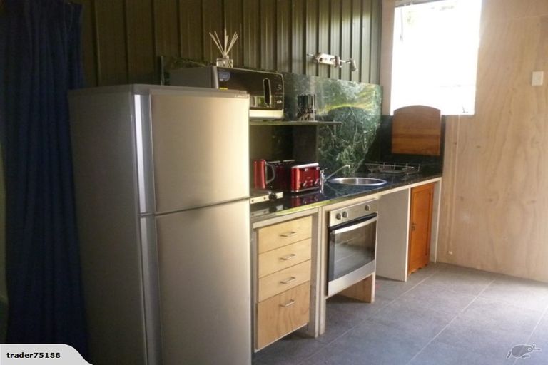 Photo of property in 787 Scenic Drive, Henderson Valley, Auckland, 0612