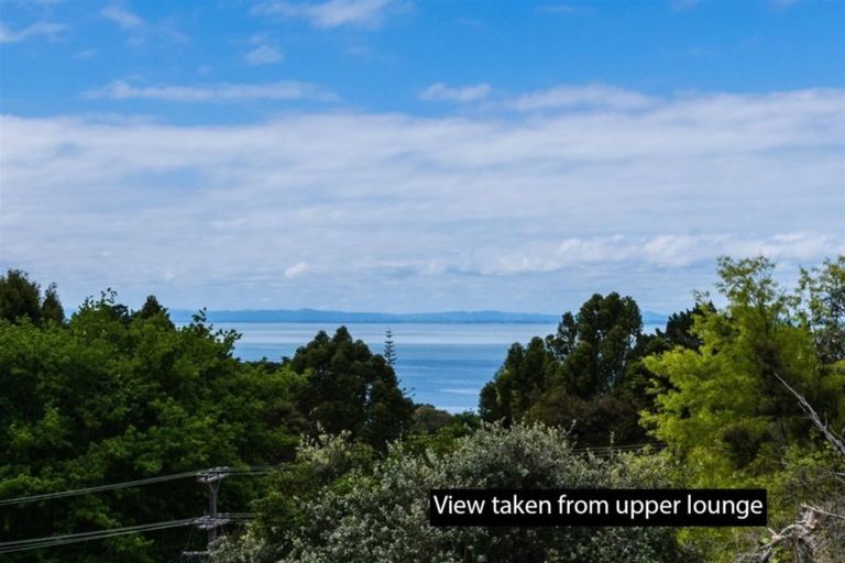 Photo of property in 34 Rauhuia Crescent, Parau, Auckland, 0604