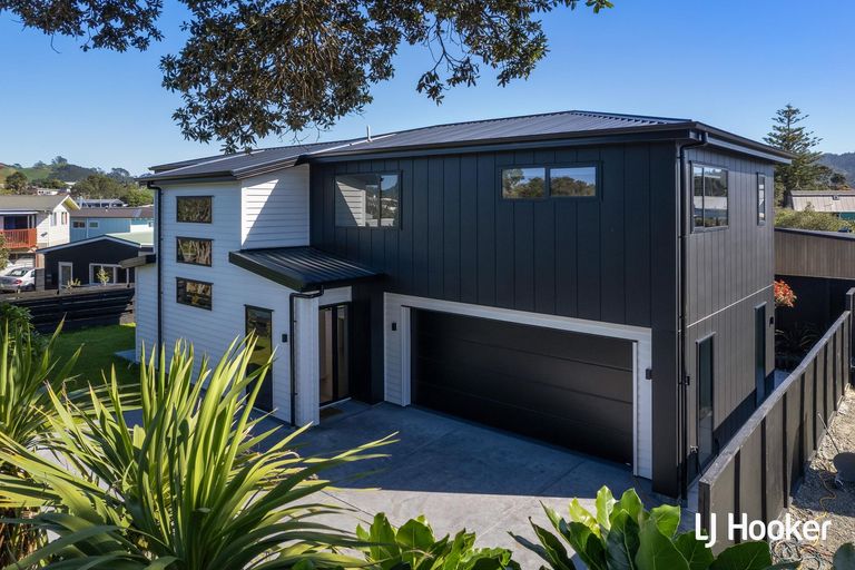 Photo of property in 1/40 Waiparaheka Drive, Wainui, 0932