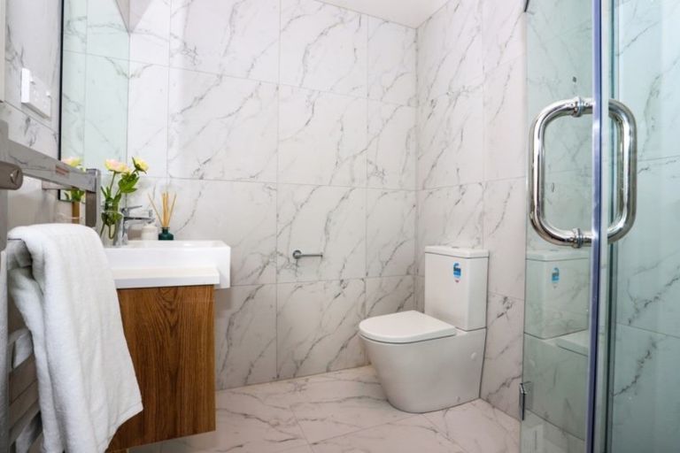 Photo of property in 21 Merv Clarke Lane, Massey, Auckland, 0614