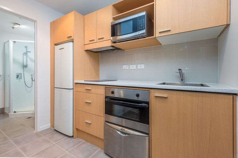 Photo of property in Kiwi On Queen Apartments, 211/421 Queen Street, Auckland Central, Auckland, 1010