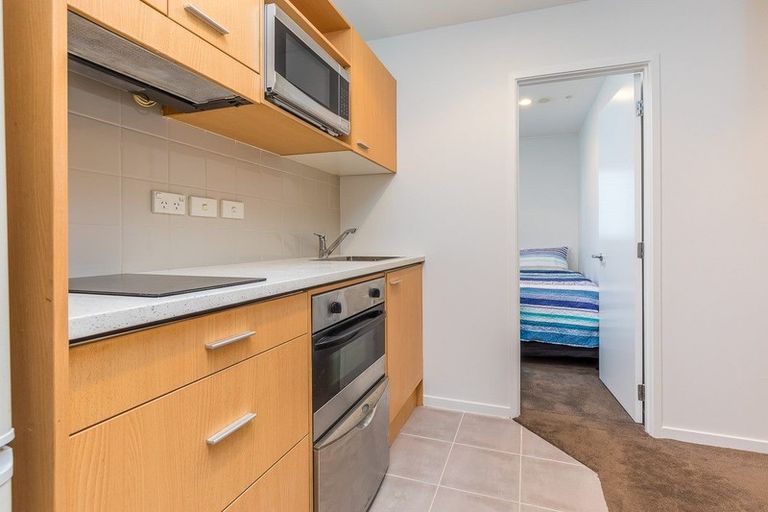 Photo of property in Kiwi On Queen Apartments, 211/421 Queen Street, Auckland Central, Auckland, 1010