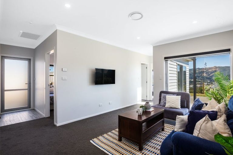 Photo of property in 21 Rotorua Grove, Aotea, Porirua, 5024