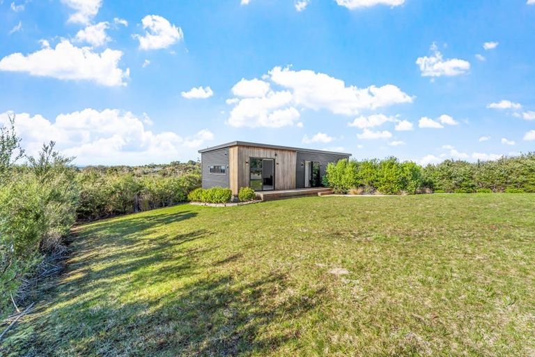 Photo of property in 1119a Whangaparaoa Road, Tindalls Beach, Whangaparaoa, 0930